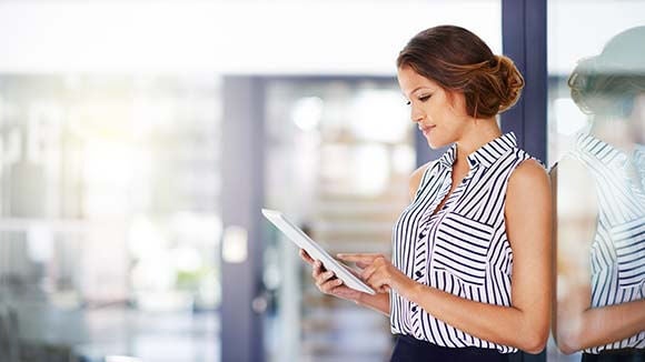 women looking at empowering women videos on ipad